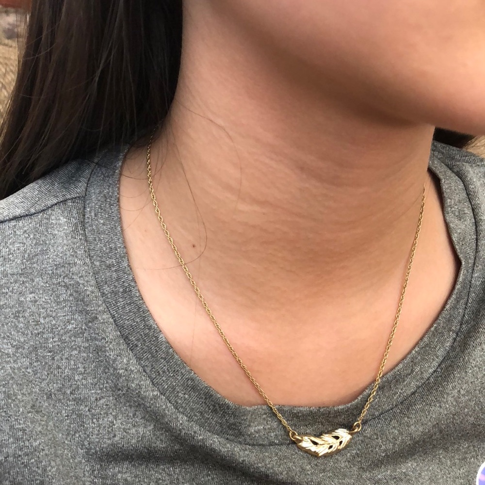 Gold feather necklace